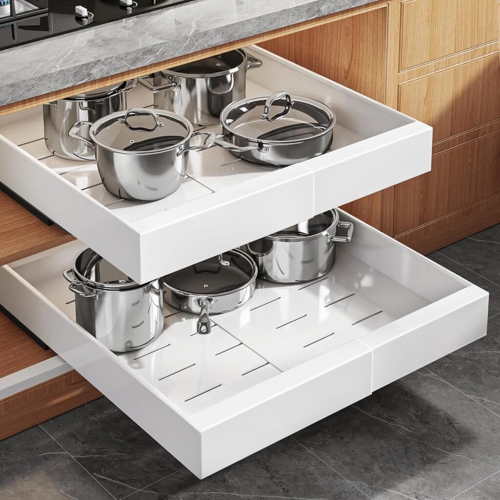 Pull-out cabinet shelves organizing pots and pans in a kitchen cabinet