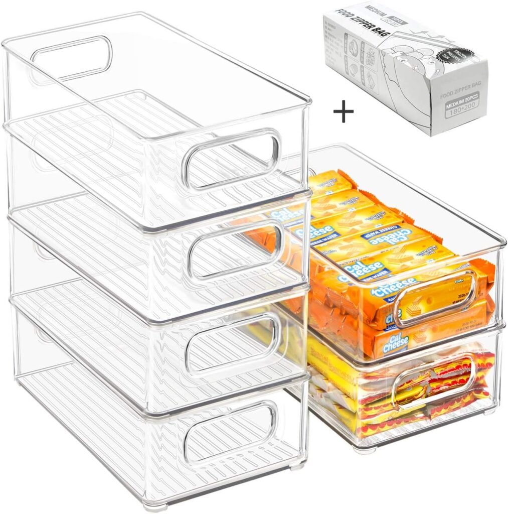 Clear stackable refrigerator storage bins with handles for organizing snacks and food